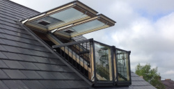 Installation of a Velux window system in a slate roof in Somerset.